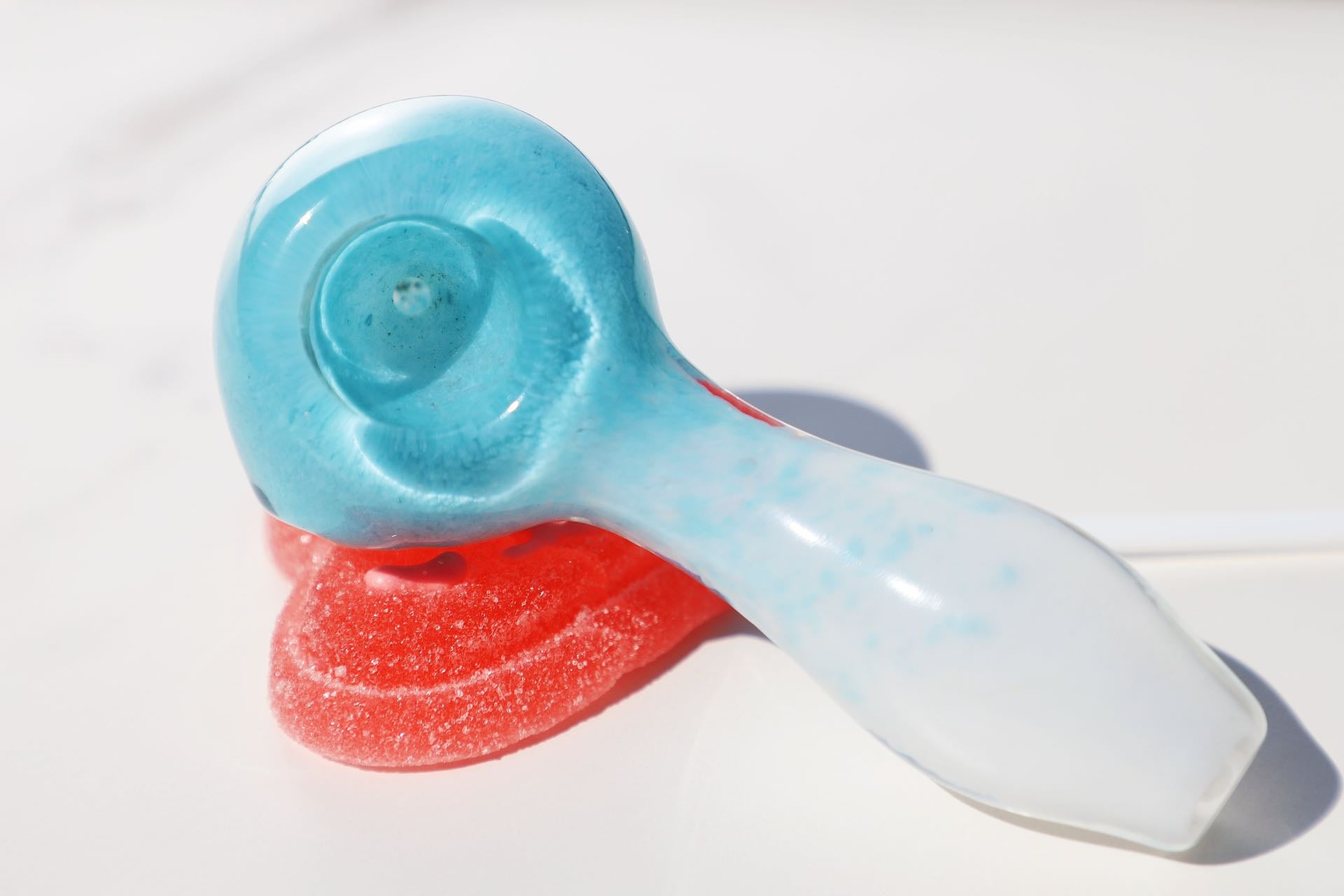 Candy-Inspired Glass Pipes to Sweeten Your Smoking Sessions, colorful hand-blown glass smoking accessories with playful designs, perfect for enhancing the smoking experience with a touch of sweetness blue