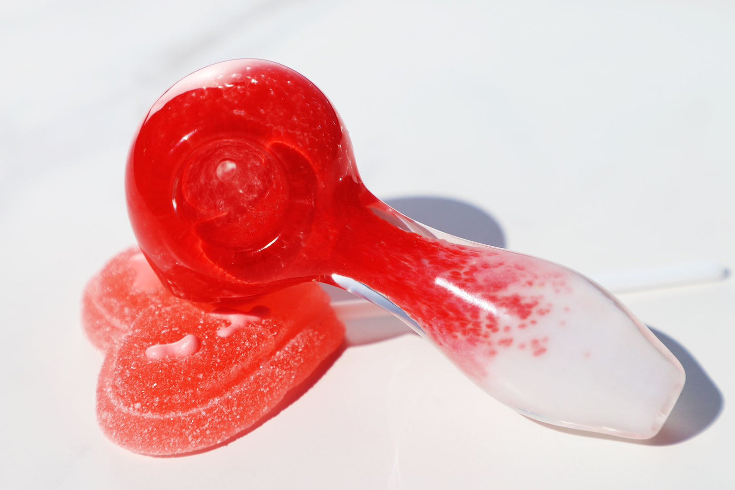 Candy-Inspired Glass Pipes to Sweeten Your Smoking Sessions, colorful hand-blown glass smoking accessories with playful designs, perfect for enhancing the smoking experience with a touch of sweetness red glass pipe