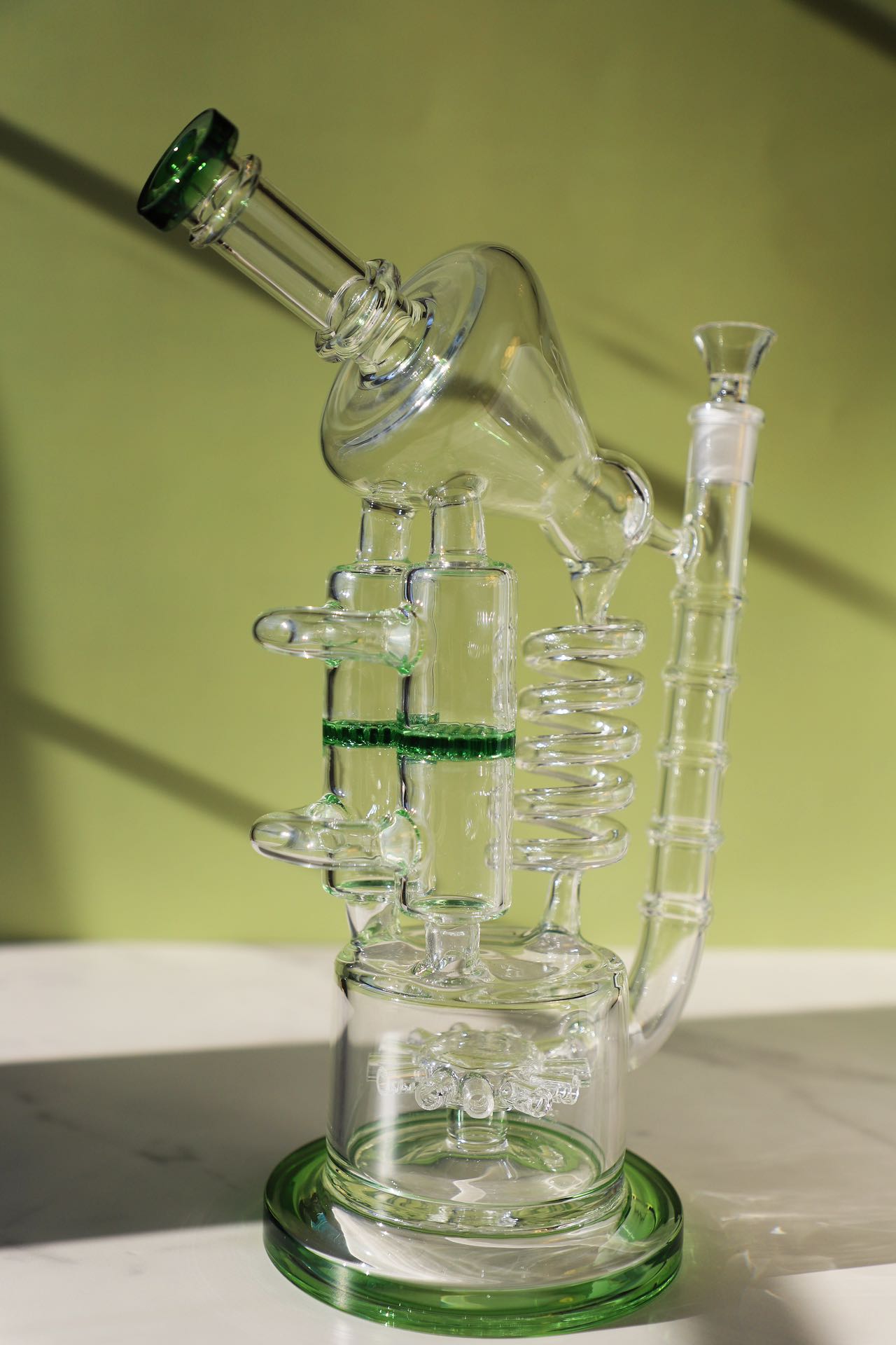 Elegant Curve Jellyfish Percolator Bong with Green Accents for the Ultimate Smooth Smoking Experience, featuring a Curve Percolator Bong design, Green Glass Bong detailing, offering a Smooth Smoking Experience with Advanced Filtration from a Glass Water Pipe