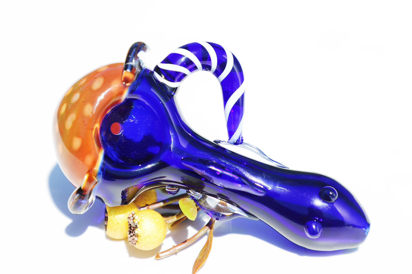 Enigmatic Monkey Glass Smoking Pipe with a Colorful Twist, showcasing green and blue hues, a compact and intricate design for an enhanced smoking experience