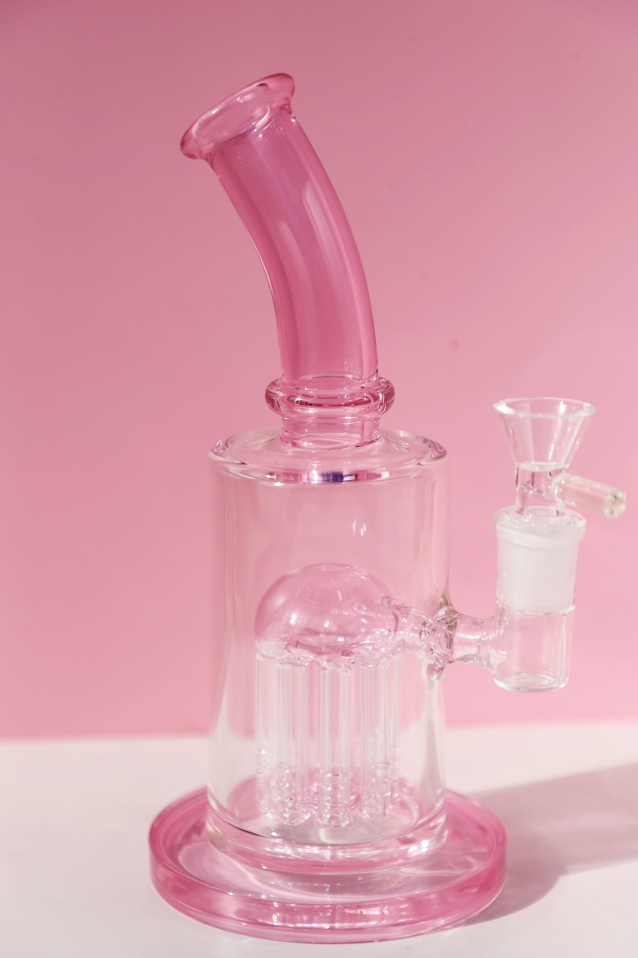Elegant Pink Glass Bong with Smooth Percolation System, Ideal for a Refined Smoking Experience, Artisan-Crafted with Unique Jellyfish Charm. Stylish Green Glass Bong with Jellyfish Charm Design, Enhanced with a High-Performance Percolator for Pure Hits, Handmade for Quality Smoking.