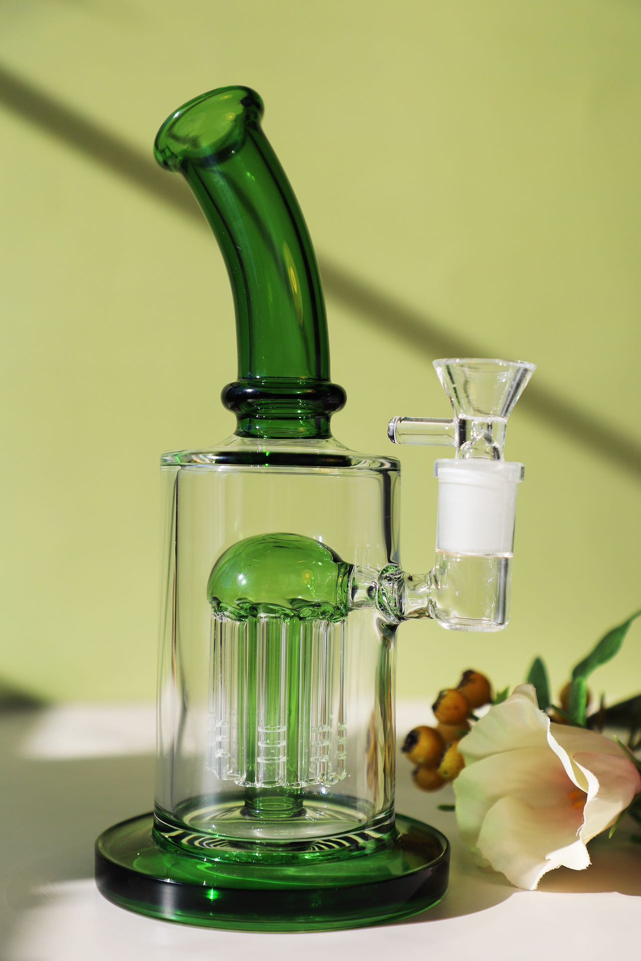 Elegant Pink Glass Bong with Smooth Percolation System, Ideal for a Refined Smoking Experience, Artisan-Crafted with Unique Jellyfish Charm. Stylish Green Glass Bong with Jellyfish Charm Design, Enhanced with a High-Performance Percolator for Pure Hits, Handmade for Quality Smoking.