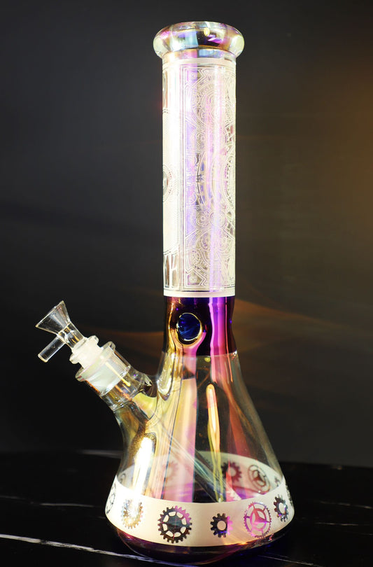 Step into sophistication with the Luxe Heavy Iridescent Glass Bong, a symbol of exquisite craftsmanship and robust elegance. This super thick glass bong shines with an iridescent play of colors, highlighting its premium build and artistic detail for a luxurious smoking experience. Perfect for collectors seeking both style and function in their smoking gear