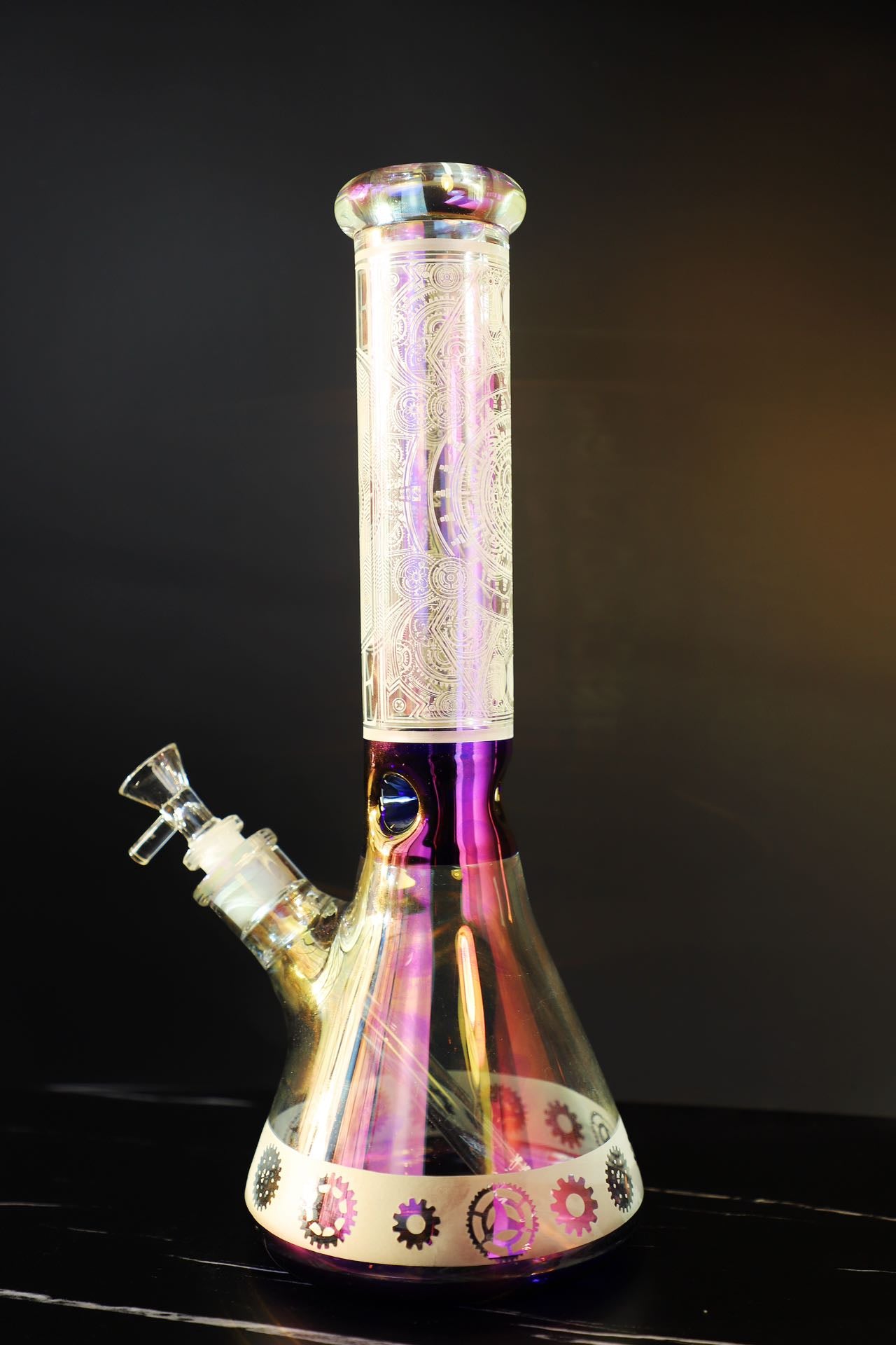 Step into sophistication with the Luxe Heavy Iridescent Glass Bong, a symbol of exquisite craftsmanship and robust elegance. This super thick glass bong shines with an iridescent play of colors, highlighting its premium build and artistic detail for a luxurious smoking experience. Perfect for collectors seeking both style and function in their smoking gear