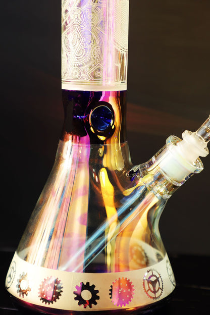 Step into sophistication with the Luxe Heavy Iridescent Glass Bong, a symbol of exquisite craftsmanship and robust elegance. This super thick glass bong shines with an iridescent play of colors, highlighting its premium build and artistic detail for a luxurious smoking experience. Perfect for collectors seeking both style and function in their smoking gear