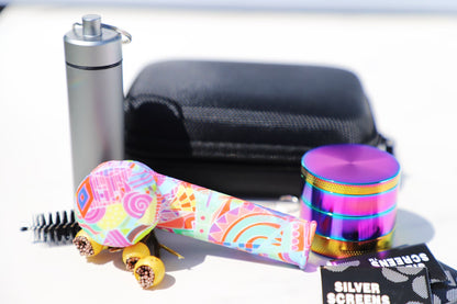 Vibrant SiliconCoco-Themed Ghost Skull Pipe Set paired with a Rainbow Grinder. This Floral Silicon Smoking Pipe and robust grinder kit capture the essence of the Coco theme. The set is portable and designed for style-savvy individuals who value a blend of fun design and practicality