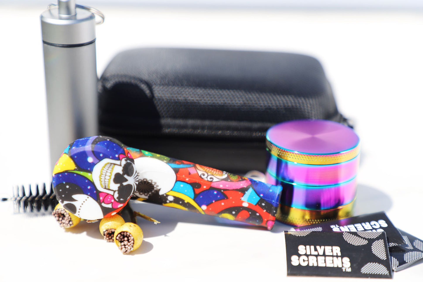 Vibrant SiliconCoco-Themed Ghost Skull Pipe Set paired with a Rainbow Grinder. This Floral Silicon Smoking Pipe and robust grinder kit capture the essence of the Coco theme. The set is portable and designed for style-savvy individuals who value a blend of fun design and practicality