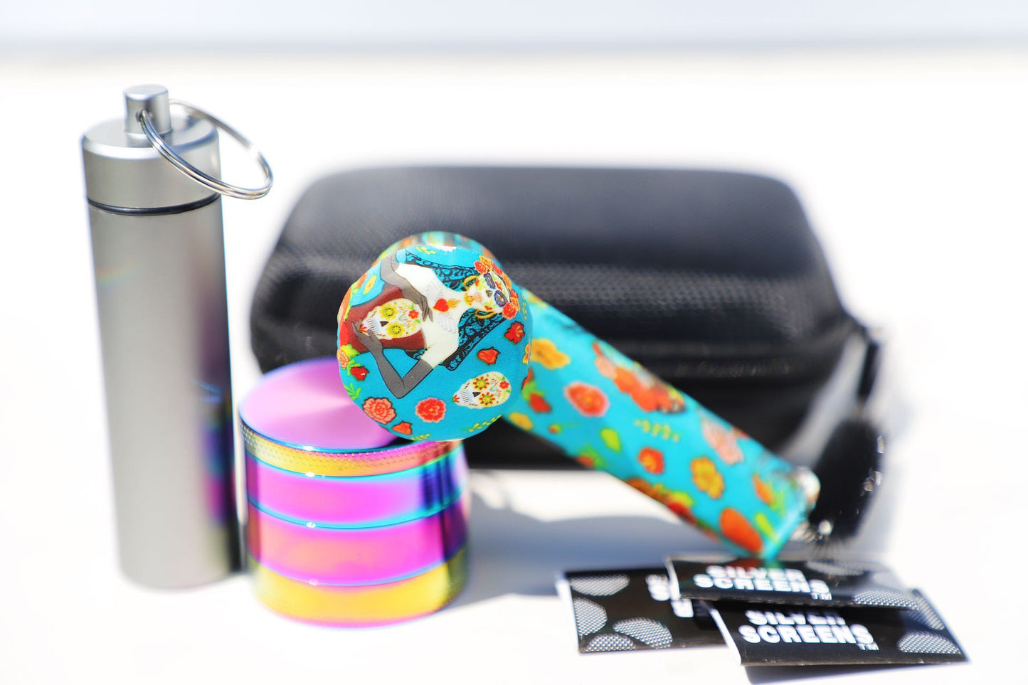 Vibrant SiliconCoco-Themed Ghost Skull Pipe Set paired with a Rainbow Grinder. This Floral Silicon Smoking Pipe and robust grinder kit capture the essence of the Coco theme. The set is portable and designed for style-savvy individuals who value a blend of fun design and practicality