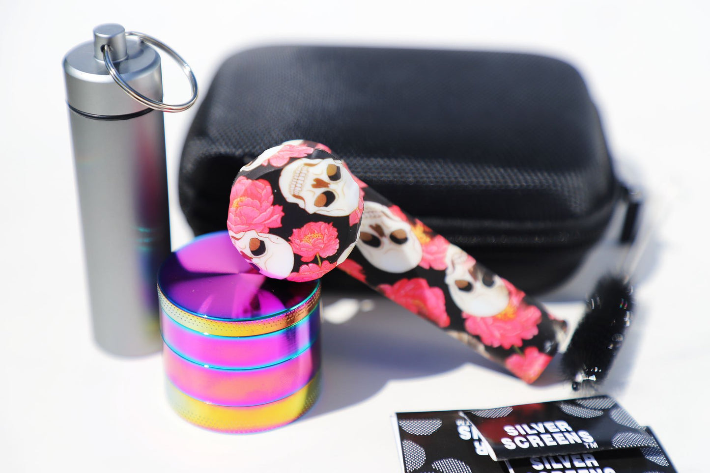 Vibrant SiliconCoco-Themed Ghost Skull Pipe Set paired with a Rainbow Grinder. This Floral Silicon Smoking Pipe and robust grinder kit capture the essence of the Coco theme. The set is portable and designed for style-savvy individuals who value a blend of fun design and practicality