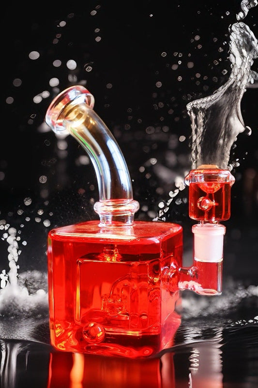Unleash a frost-enhanced smoking experience with the Smooth Chill Glycerin Coil Bong collection. Featuring elegant glassware in vibrant red, purple, and green, these square-base, bent-neck bongs with ice catchers offer a modern smoke piece design for a sleek and sophisticated session