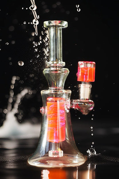 Discover the ultimate cool with our Spiral Freezable Glycerin Bong, available in striking red and pink. Enjoy smooth, ice-cold hits thanks to its unique glycerin chamber—ideal for an enhanced smoking experience. A perfect fusion of style and function for the modern smoke