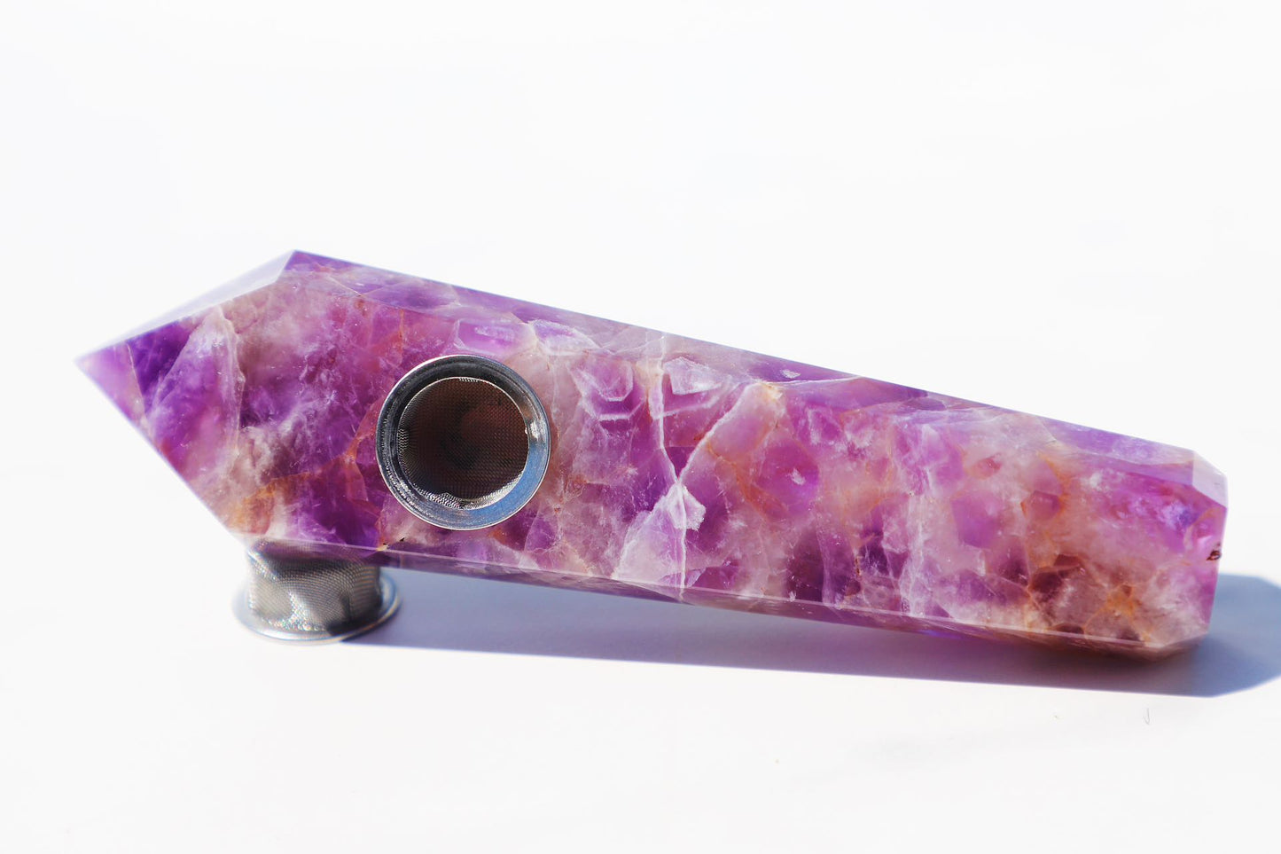 Exquisite Amethyst Crystal Smoking Pipe Set, showcasing a luxurious natural amethyst or black gemstone design with vibrant purple hues and crystalline patterns. This high-quality, portable smoking accessory is complete with a protective travel case, rainbow grinder metal mesh filters, and a cleaning brush for upkeep. Embrace the elegance of natural stone craftsmanship, perfect for enhancing the smoking experience with style and a touch of tranquility