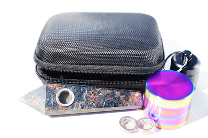 Exquisite Amethyst Crystal Smoking Pipe Set, showcasing a luxurious natural amethyst or black gemstone design with vibrant purple hues and crystalline patterns. This high-quality, portable smoking accessory is complete with a protective travel case, rainbow grinder metal mesh filters, and a cleaning brush for upkeep. Embrace the elegance of natural stone craftsmanship, perfect for enhancing the smoking experience with style and a touch of tranquility