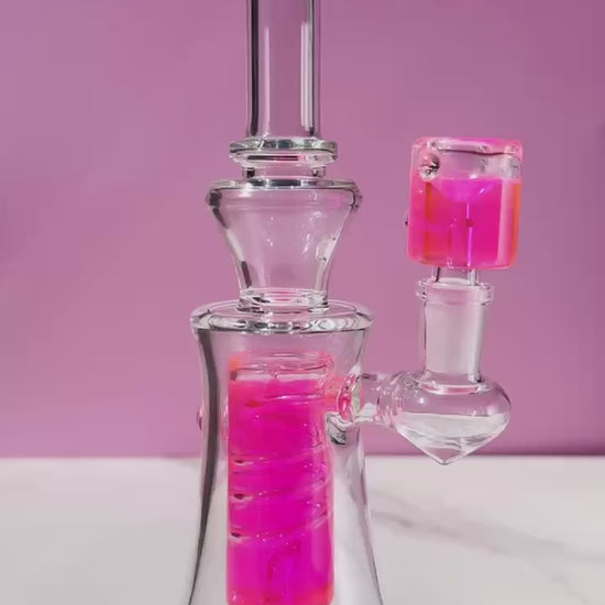 Discover the ultimate cool with our Spiral Freezable Glycerin Bong, available in striking red and pink. Enjoy smooth, ice-cold hits thanks to its unique glycerin chamber—ideal for an enhanced smoking experience. A perfect fusion of style and function for the modern smoke