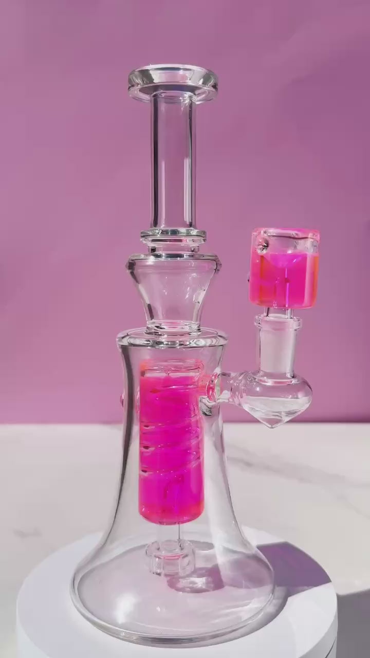 Discover the ultimate cool with our Spiral Freezable Glycerin Bong, available in striking red and pink. Enjoy smooth, ice-cold hits thanks to its unique glycerin chamber—ideal for an enhanced smoking experience. A perfect fusion of style and function for the modern smoke