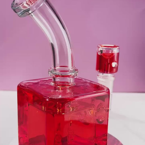 Unleash a frost-enhanced smoking experience with the Smooth Chill Glycerin Coil Bong collection. Featuring elegant glassware in vibrant red, purple, and green, these square-base, bent-neck bongs with ice catchers offer a modern smoke piece design for a sleek and sophisticated session